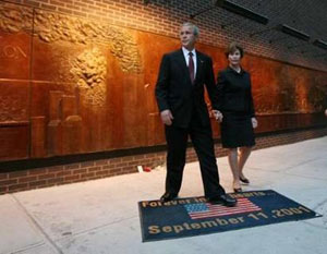 Bush steps on a flag carpet, a fitting metaphor.